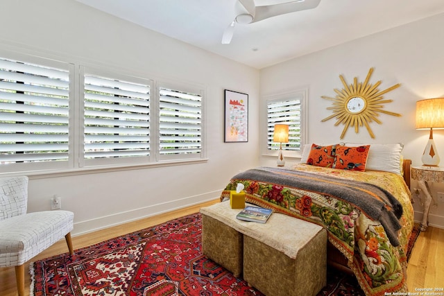 bedroom featuring ceiling fan and hardwood / wood-style floors