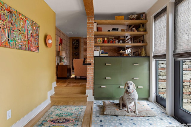 recreation room featuring light wood-type flooring