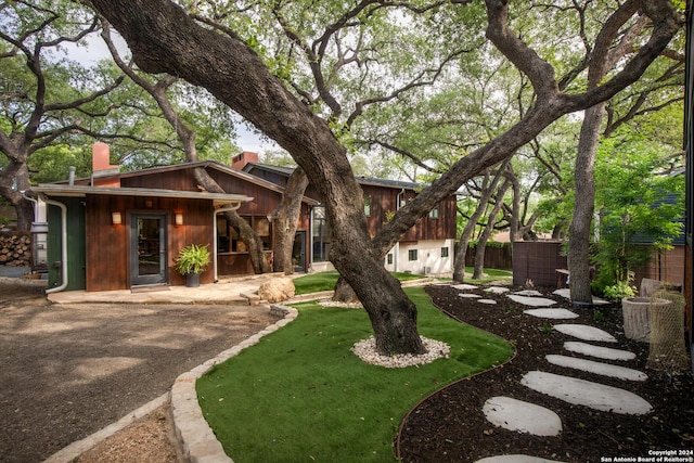 view of front of home with a front yard