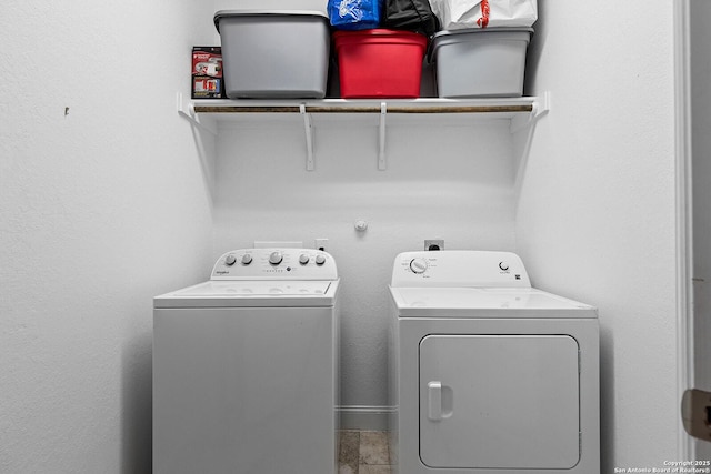 laundry room featuring washer and clothes dryer