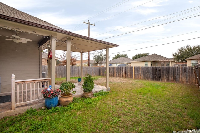 view of yard featuring ceiling fan