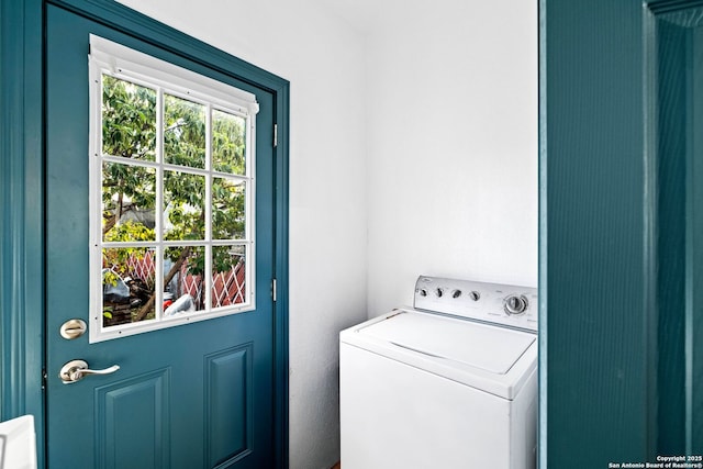 washroom with washer / clothes dryer