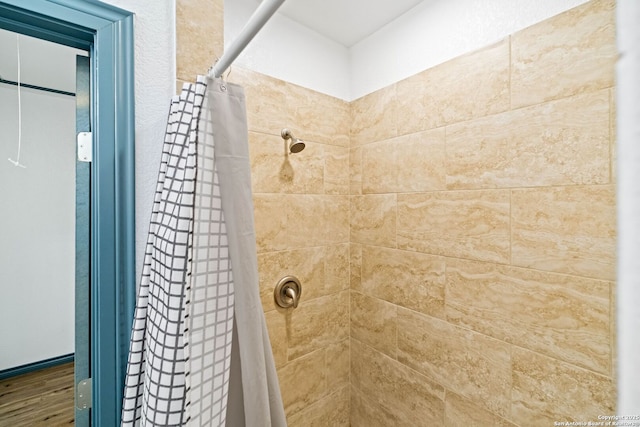 bathroom with curtained shower