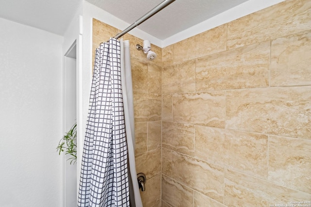 bathroom featuring curtained shower