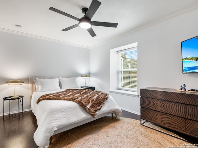 bedroom with ceiling fan, crown molding, and dark hardwood / wood-style floors