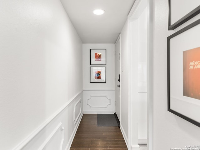 hallway featuring dark wood-type flooring