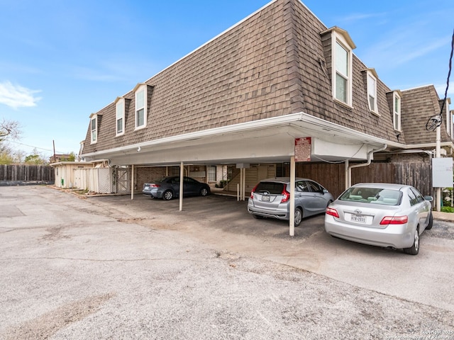 exterior space with a carport