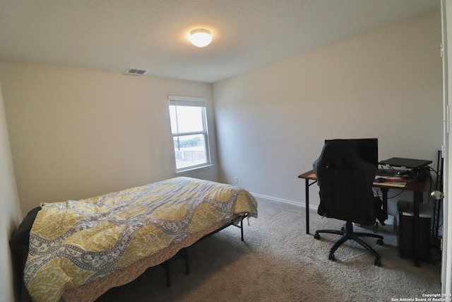 bedroom featuring carpet