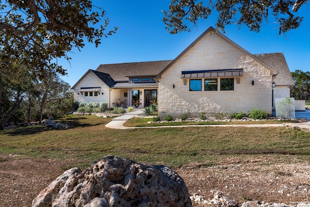 view of front of house with a front lawn