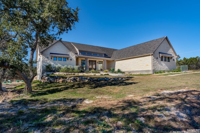 view of front of property with a front yard