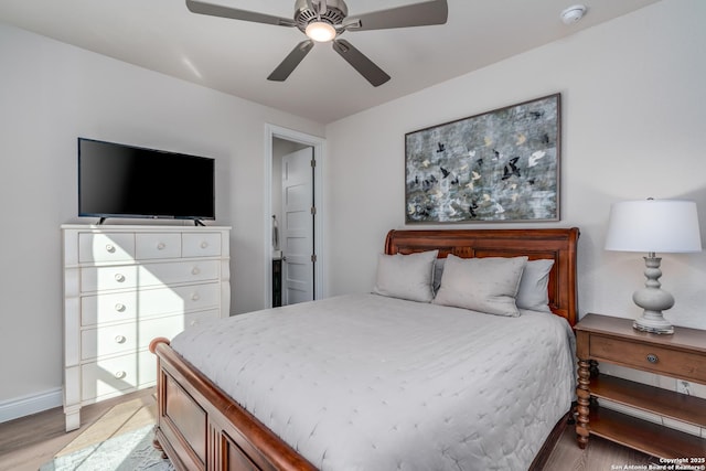 bedroom with wood-type flooring and ceiling fan