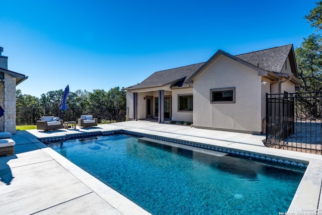 view of pool with a patio area and outdoor lounge area