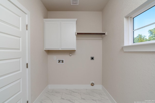 laundry area featuring washer hookup, cabinets, and electric dryer hookup