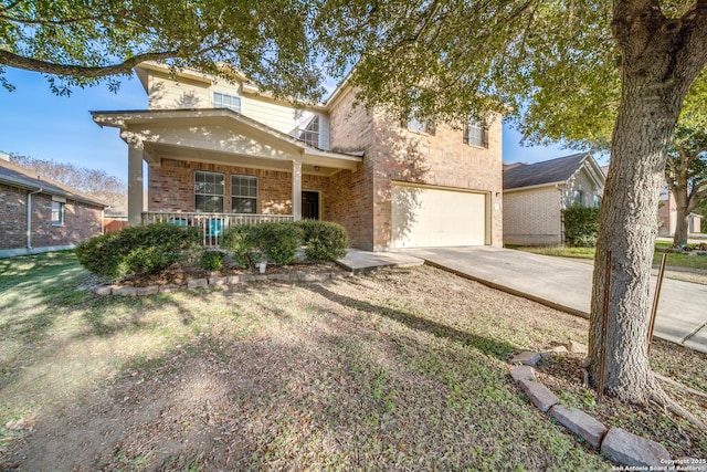 front facade featuring covered porch and a garage