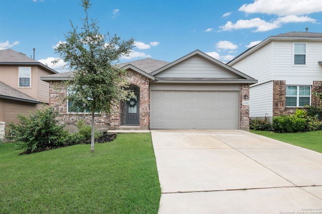 view of front of house featuring a front lawn and a garage