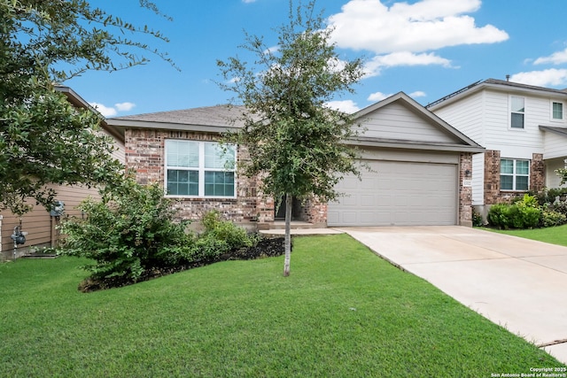 view of front of home with a front lawn and a garage