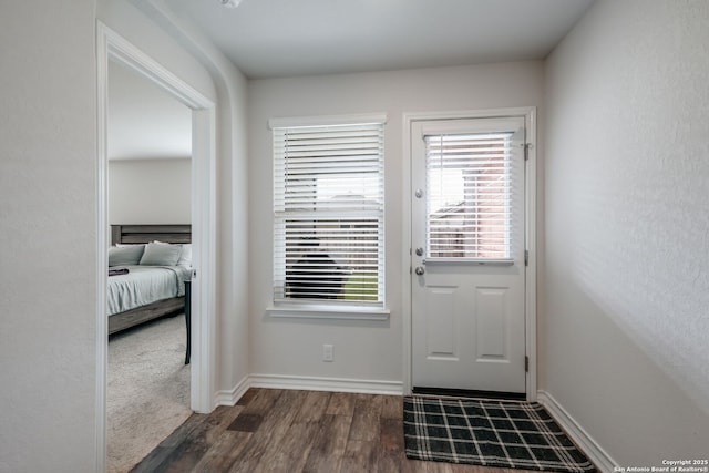 doorway featuring dark hardwood / wood-style flooring