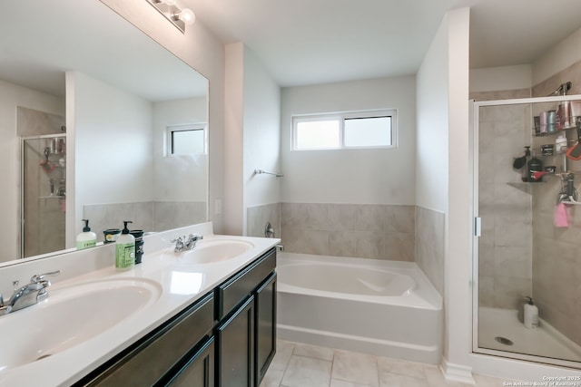 bathroom with vanity, tile patterned flooring, and independent shower and bath