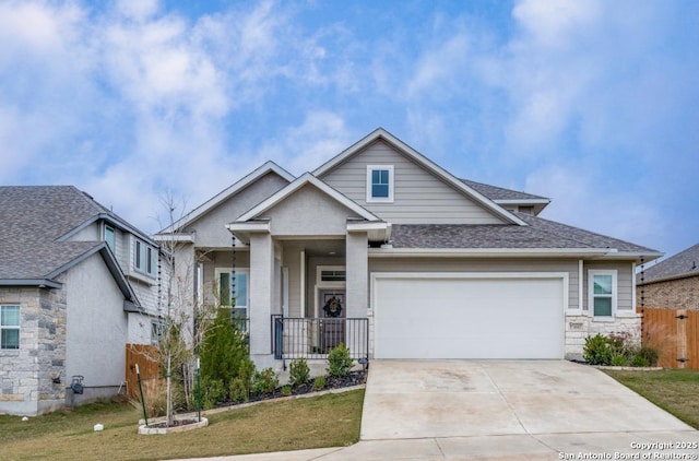 view of front facade with a front yard and a garage