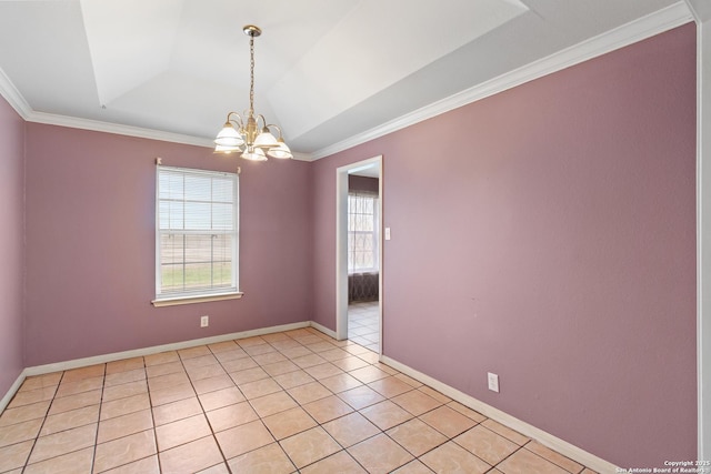 tiled spare room featuring an inviting chandelier, a tray ceiling, and crown molding