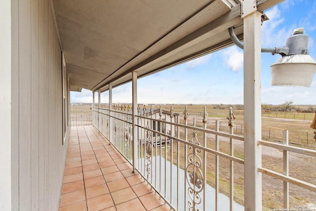 balcony featuring a rural view