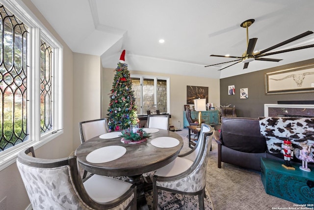 dining area with ceiling fan, a healthy amount of sunlight, and crown molding