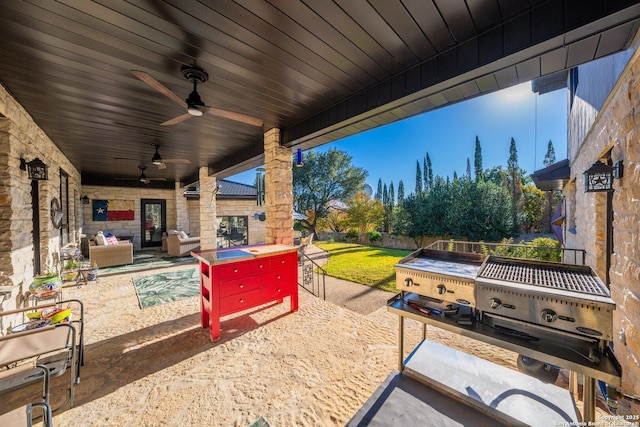 view of patio with ceiling fan