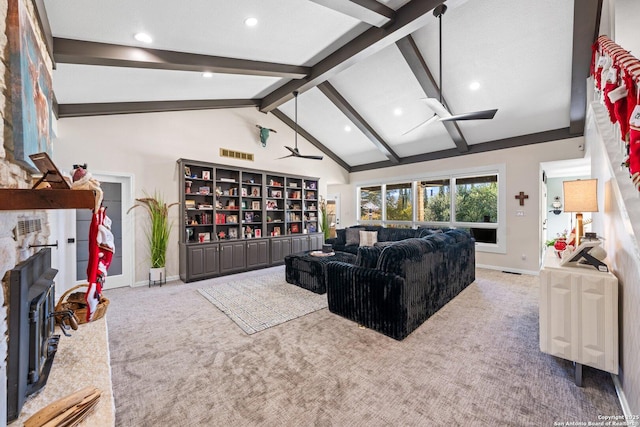 living room featuring ceiling fan, vaulted ceiling with beams, and carpet