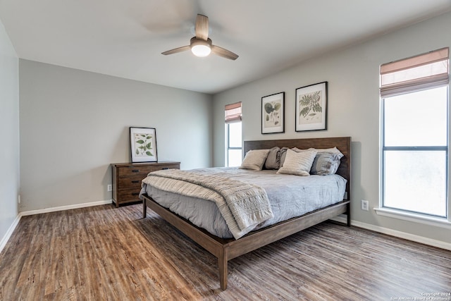 bedroom featuring hardwood / wood-style flooring and ceiling fan