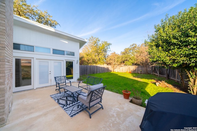 view of patio / terrace featuring french doors