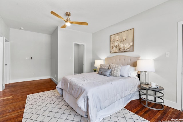 bedroom with light wood-type flooring and ceiling fan