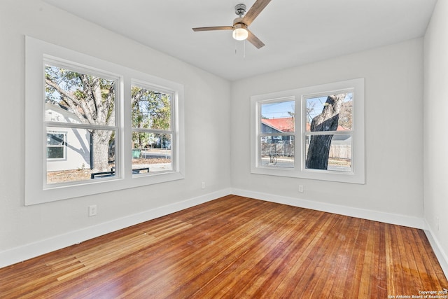 unfurnished room featuring ceiling fan and wood-type flooring