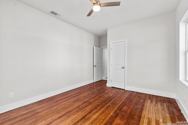 unfurnished bedroom with hardwood / wood-style flooring and ceiling fan