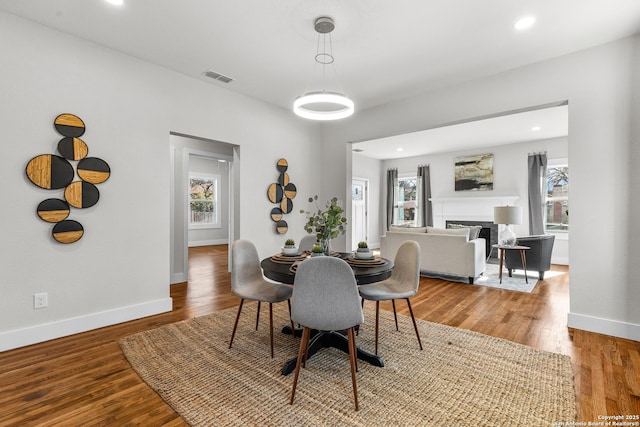 dining room with light hardwood / wood-style flooring