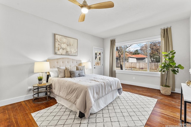 bedroom with hardwood / wood-style flooring and ceiling fan