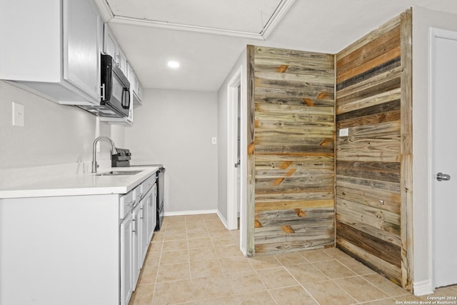 kitchen with wood walls and sink