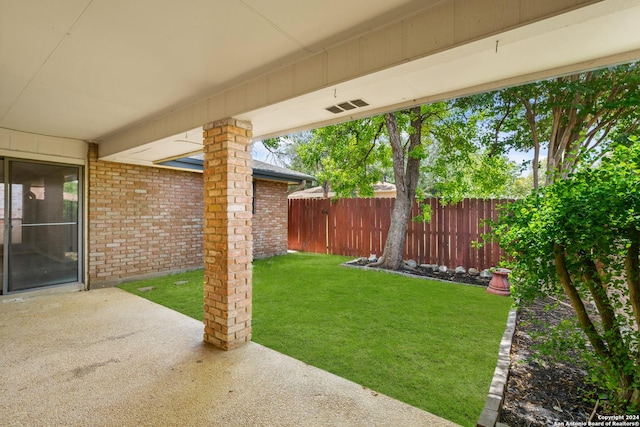 view of yard with a patio area