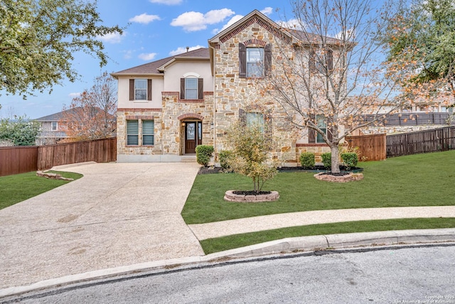 view of property featuring a front yard