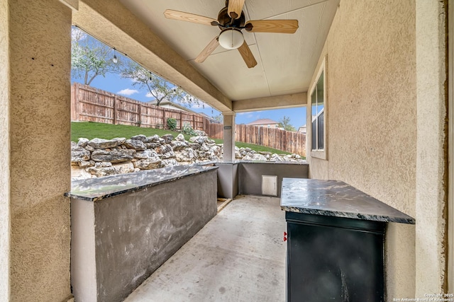 view of patio / terrace with ceiling fan