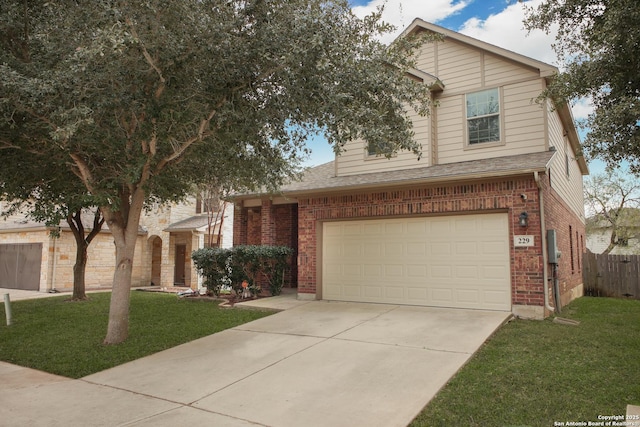 view of front of house featuring a front yard and a garage