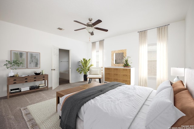 bedroom featuring ceiling fan, light colored carpet, and multiple windows