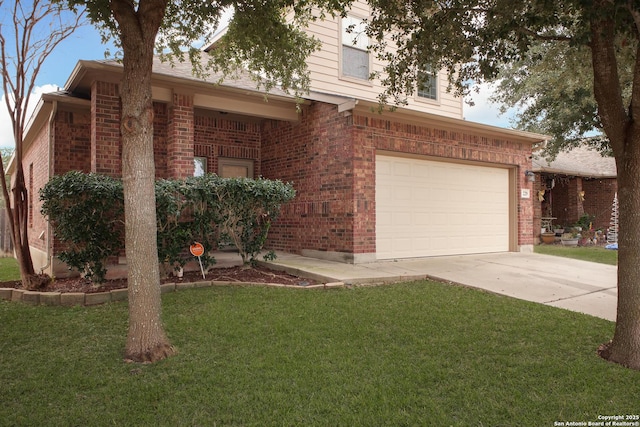 view of front of house with a garage and a front lawn