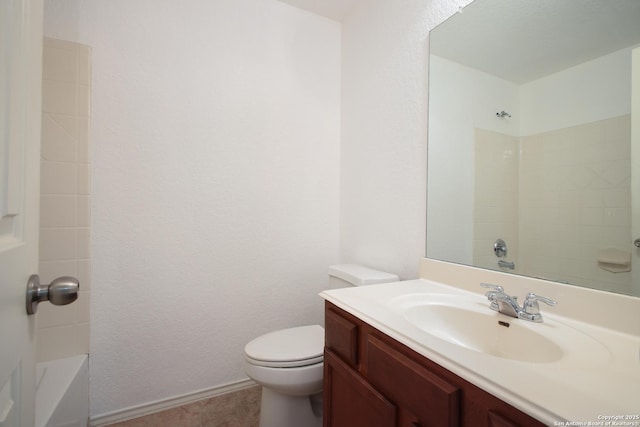 bathroom with toilet and vanity