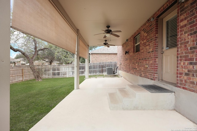 view of patio featuring central air condition unit and ceiling fan