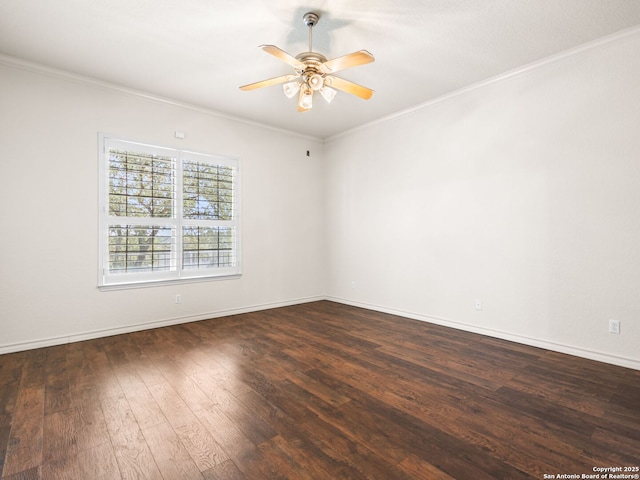 spare room featuring ornamental molding, dark hardwood / wood-style flooring, and ceiling fan