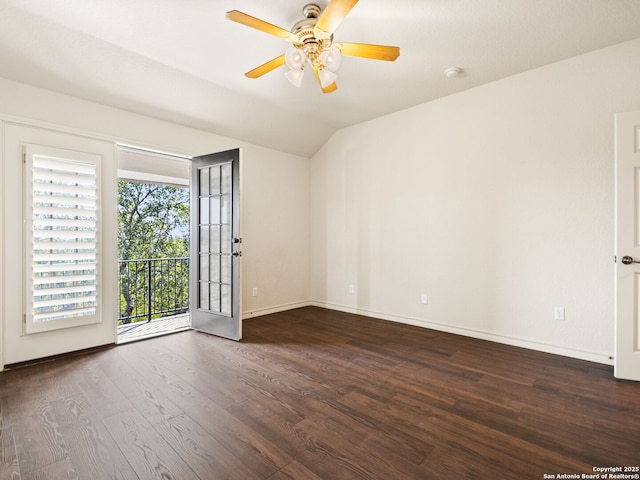 unfurnished room featuring lofted ceiling, french doors, dark hardwood / wood-style flooring, and ceiling fan