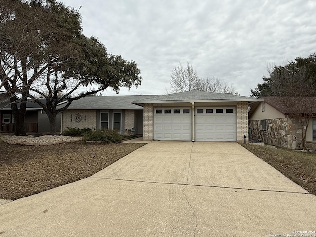 single story home with a garage