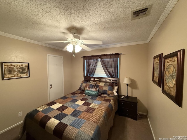 carpeted bedroom featuring ceiling fan, ornamental molding, and a textured ceiling