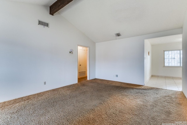 unfurnished room featuring light colored carpet, beam ceiling, and high vaulted ceiling