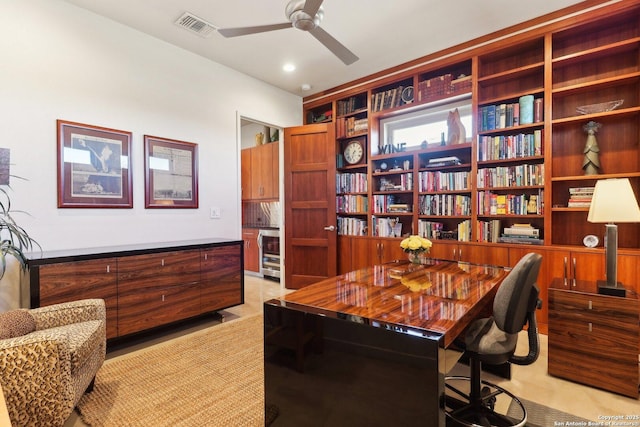 office space with ceiling fan and wine cooler